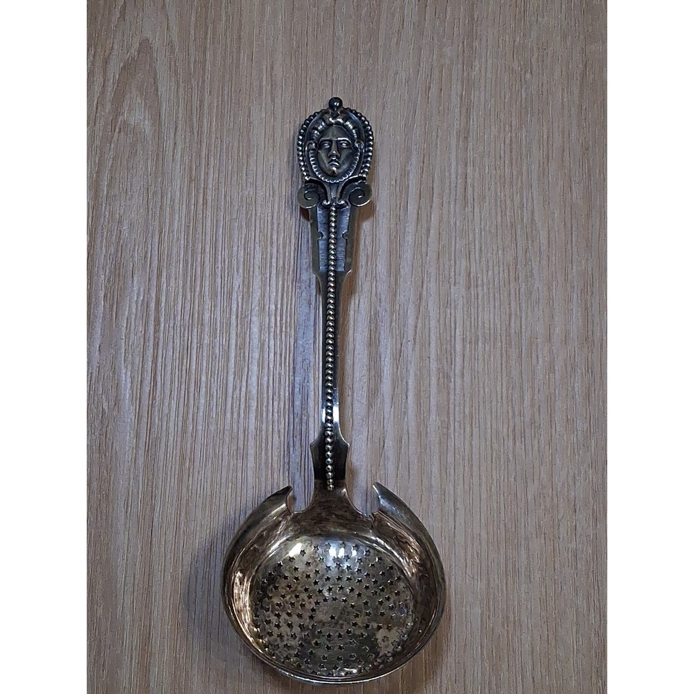 WOOD & HUGHES pierced Serving Ladle / Sifter MEDALLION 3D face. Rare 1870s